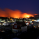 Wildfires threatened Chile’s Dichato community on Jan. 30th, 2017, forcing the evacuation of over 800 families. Image: AP Photo/Esteban Felix
